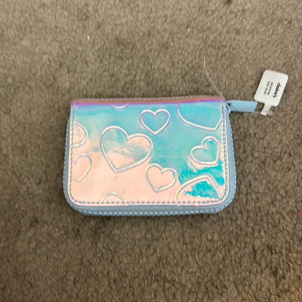 NWT Claire’s  iridescent heart wallet.